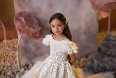 All the Frills Communion Gown with ruffled short sleeves